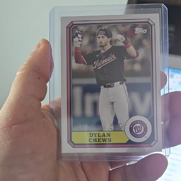 Topps Card with Player in Black and Red Uniform - Picture 1 of 1